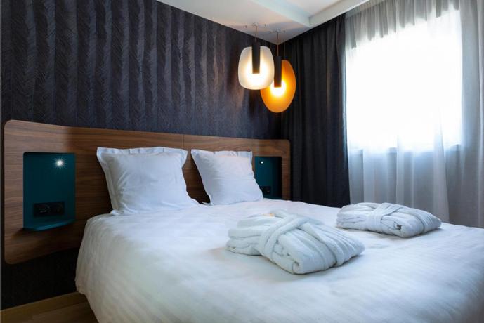 Imagen de la habitación del Hotel Oceania Paris Porte De Versailles. Foto 2