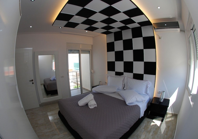 Imagen de la habitación del Hotel Oceanic Luxury Apartments. Foto 3