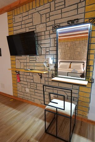 Imagen de la habitación del Hotel Oceanic Overview Suites. Foto 3