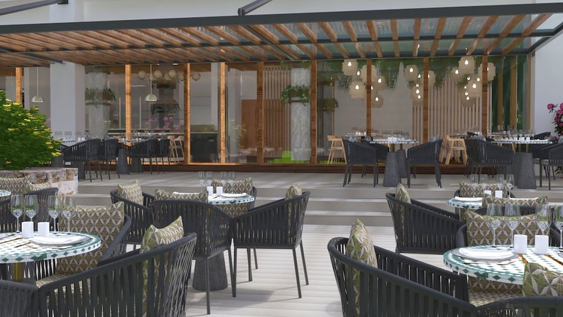 Imagen del bar/restaurante del Hotel Ocean's Creek Beach Hotel Mauritius. Foto 4