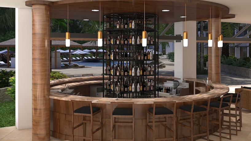 Imagen del bar/restaurante del Hotel Ocean's Creek Beach Hotel Mauritius. Foto 5