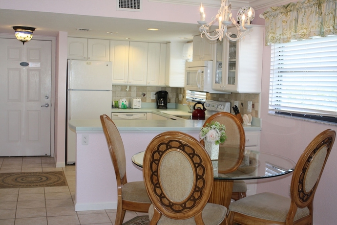 Imagen de la habitación del Hotel Ocean's Reach Condominiums. Foto 19