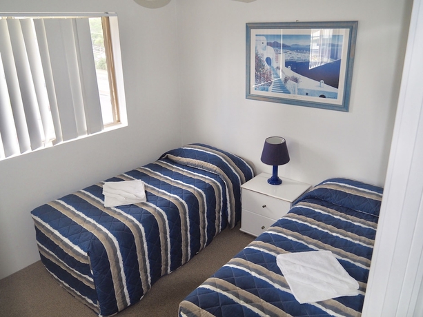 Imagen de la habitación del Hotel Oceanside Cove Holiday Apartments. Foto 5
