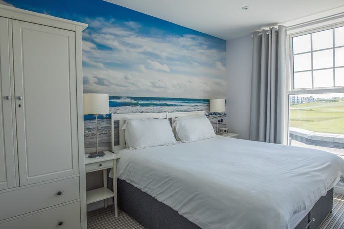 Imagen de la habitación del Hotel Oceanside. Foto 8