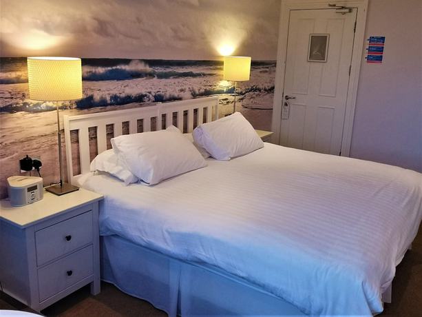 Imagen de la habitación del Hotel Oceanside. Foto 11