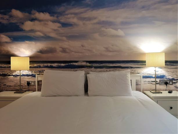 Imagen de la habitación del Hotel Oceanside. Foto 13