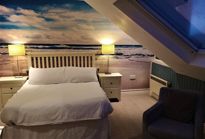 Imagen de la habitación del Hotel Oceanside. Foto 19