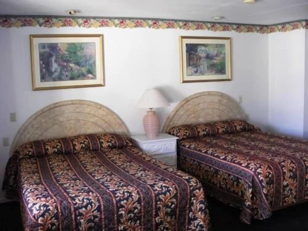 Imagen de la habitación del Hotel Oceanside Inn and Suites, A Days Inn By Wyndham. Foto 9