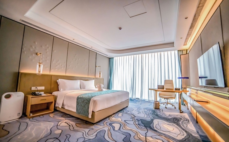 Imagen de la habitación del Hotel Oceantec Valley Qingdao. Foto 6