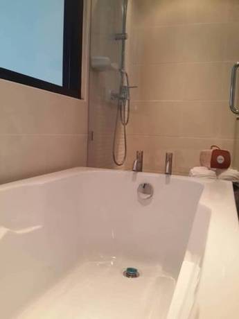 Imagen de la habitación del Hotel Oceanview Treasure and Residence. Foto 4