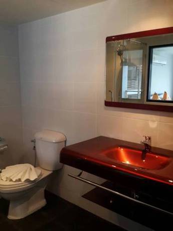 Imagen de la habitación del Hotel Oceanview Treasure and Residence. Foto 5