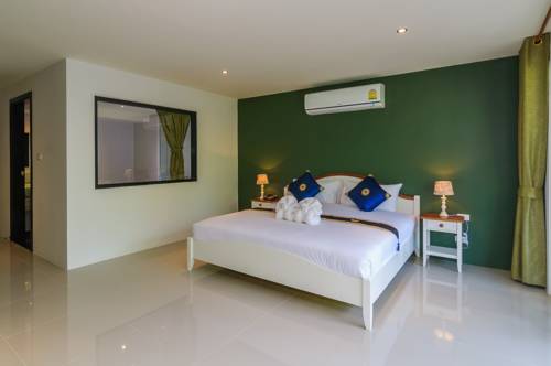 Imagen de la habitación del Hotel Oceanview Treasure and Residence. Foto 7