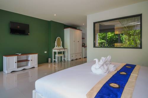 Imagen de la habitación del Hotel Oceanview Treasure and Residence. Foto 8