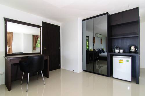 Imagen de la habitación del Hotel Oceanview Treasure and Residence. Foto 10