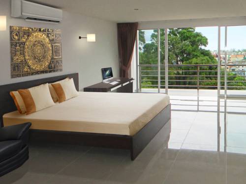 Imagen de la habitación del Hotel Oceanview Treasure and Residence. Foto 11