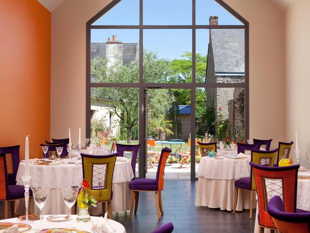 Imagen del bar/restaurante del Hotel &Ocirc; En Couleur. Foto 2