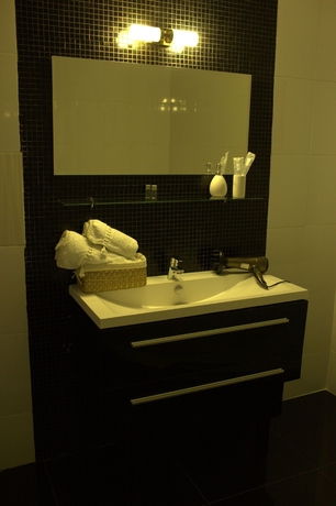 Imagen de la habitación del Hotel October Riverside Inn. Foto 8