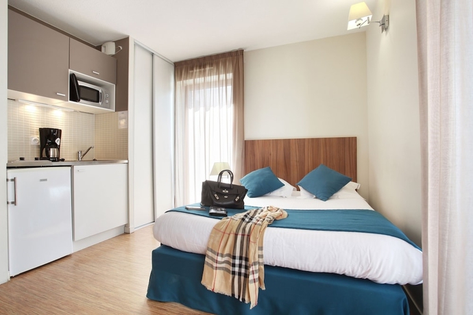 Imagen de la habitación del Hotel Odalys City Lyon Confluence. Foto 10