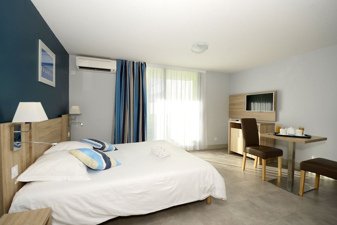 Imagen de la habitación del Hotel Odalys R&eacute;sidence Aqualia. Foto 6