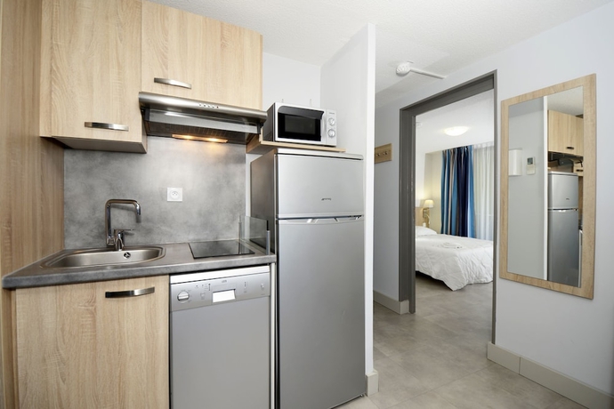 Imagen de la habitación del Hotel Odalys R&eacute;sidence Aqualia. Foto 9