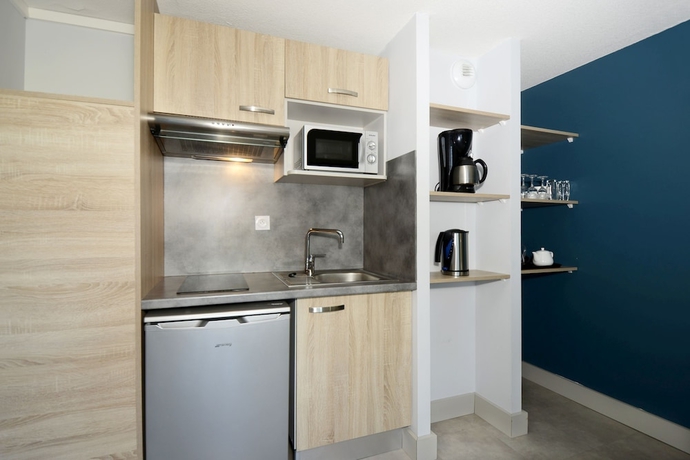 Imagen de la habitación del Hotel Odalys R&eacute;sidence Aqualia. Foto 11