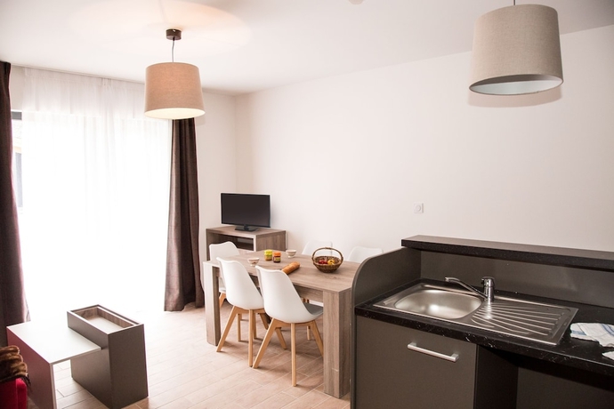 Imagen de la habitación del Hotel Odalys Résidence Prestige Isatis. Foto 11