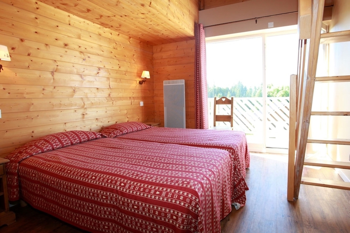 Imagen de la habitación del Hotel Od&eacute;sia Vacances Chalet Le Gr&eacute;pillon. Foto 12