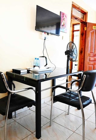 Imagen del bar/restaurante del Hotel Odelia Gardens Limited. Foto 4