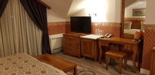 Imagen de la habitación del Hotel Odeon, Plovdiv. Foto 20