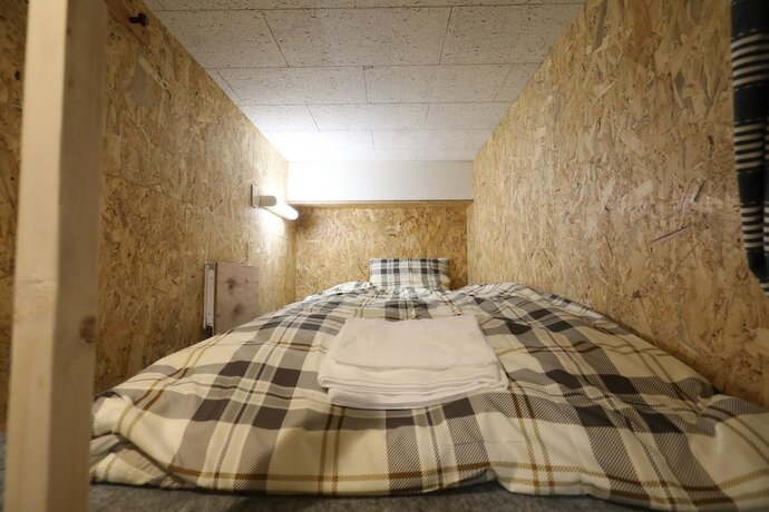 Imagen de la habitación del Hotel Odori Backpackers. Foto 12