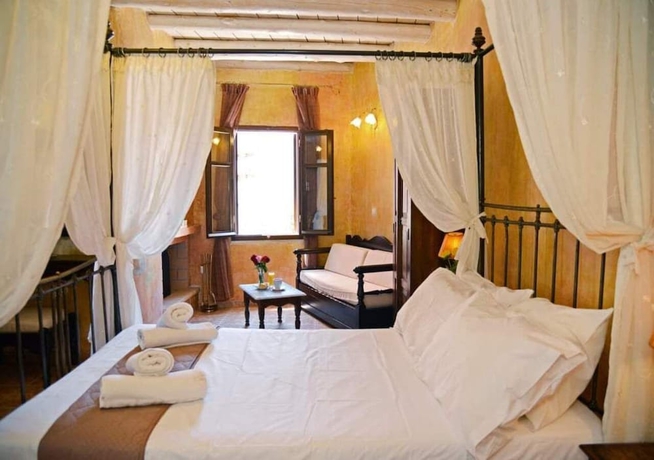 Imagen de la habitación del Hotel Odos Oneiron Boutique. Foto 14