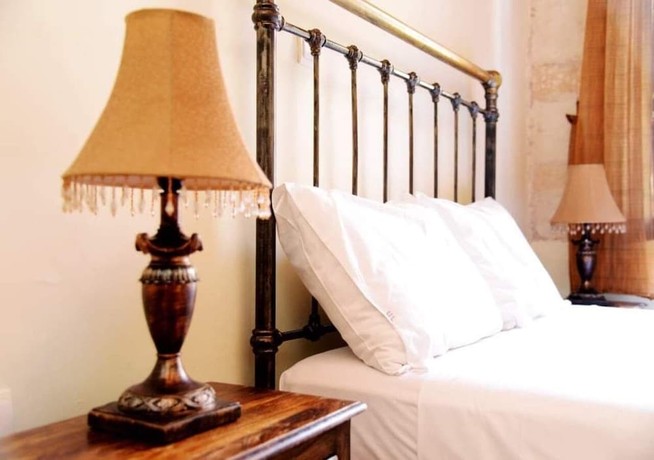 Imagen de la habitación del Hotel Odos Oneiron Boutique. Foto 15