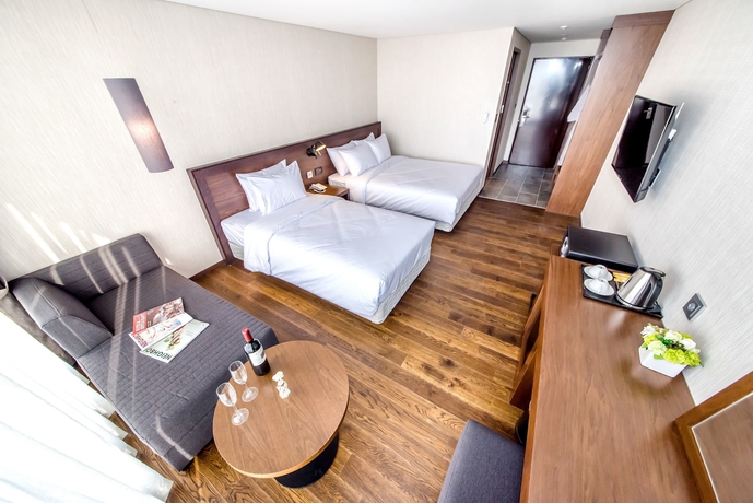 Imagen de la habitación del Hotel Odri Inn Jeju. Foto 12