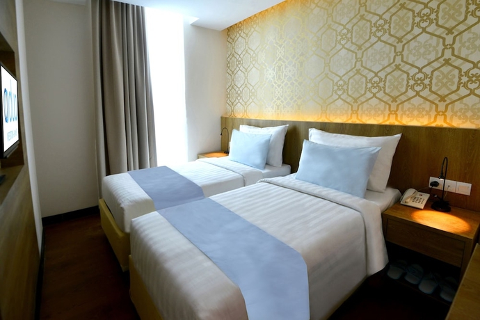 Imagen de la habitación del Hotel Odua Weston Jambi. Foto 12