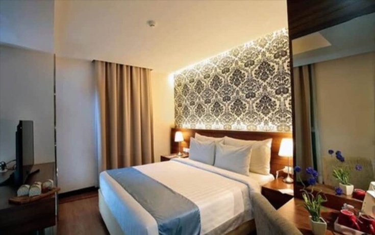 Imagen de la habitación del Hotel Odua Weston Jambi. Foto 14