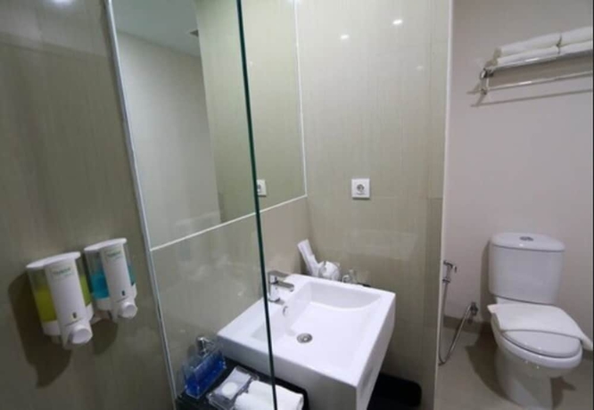 Imagen de la habitación del Hotel Odua Weston Jambi. Foto 18