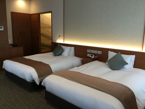 Imagen de la habitación del Hotel Odysis Suites Osaka Airport. Foto 13
