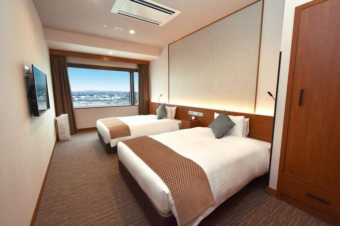 Imagen de la habitación del Hotel Odysis Suites Osaka Airport. Foto 17