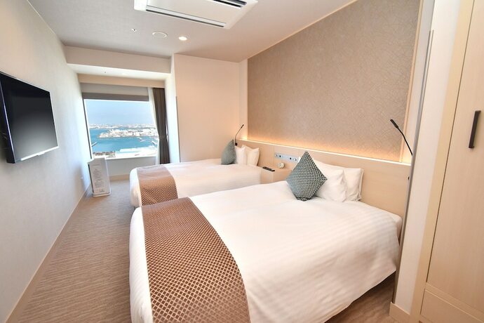 Imagen de la habitación del Hotel Odysis Suites Osaka Airport. Foto 18