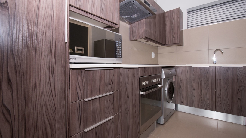 Imagen de la habitación del Hotel Odyssey Luxury Apartments. Foto 6