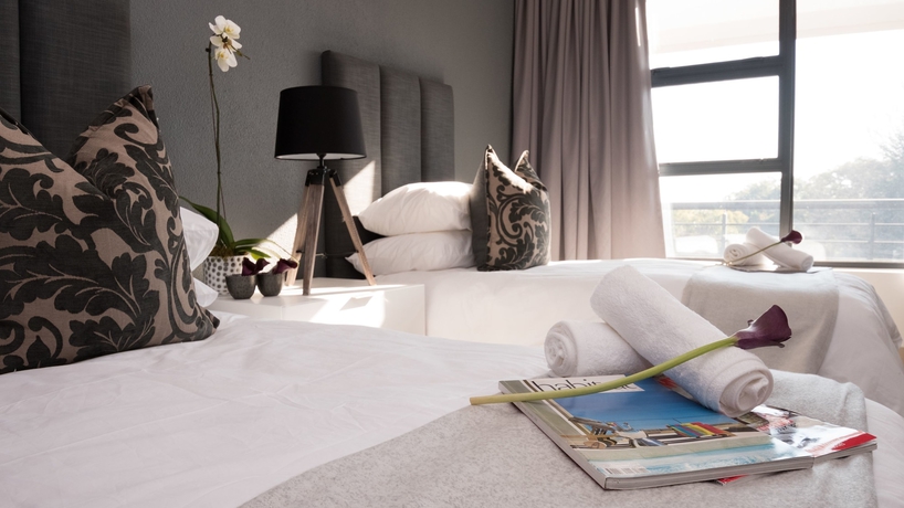 Imagen de la habitación del Hotel Odyssey Luxury Apartments. Foto 11