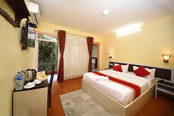 Imagen de la habitación del Hotel Odyssey Nepal. Foto 8