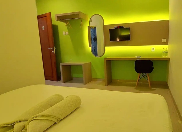 Imagen de la habitación del Hotel Oemah Djari Syariah. Foto 2