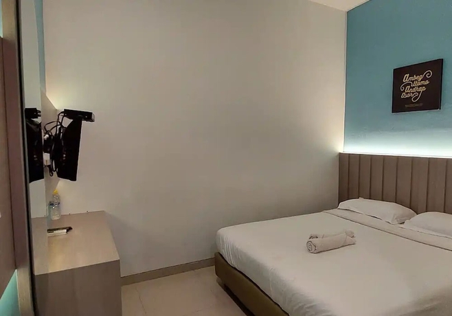 Imagen de la habitación del Hotel Oemah Djari Syariah. Foto 7