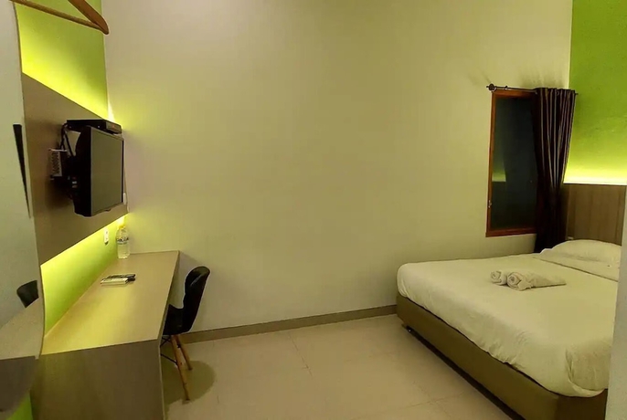 Imagen de la habitación del Hotel Oemah Djari Syariah. Foto 12
