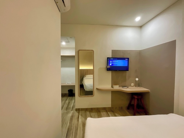 Imagen de la habitación del Hotel Oemah Djari Syariah. Foto 13
