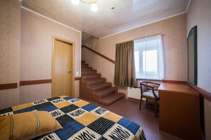 Imagen de la habitación del Hotel Ogni Murmanska. Foto 9