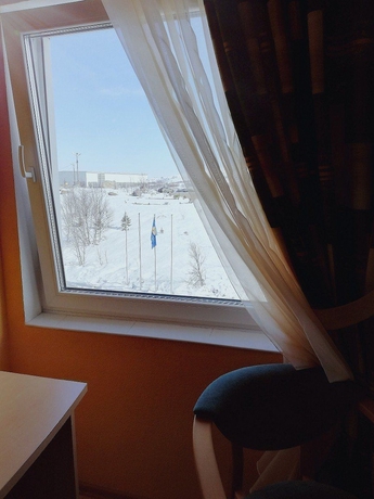 Imagen de la habitación del Hotel Ogni Murmanska. Foto 16