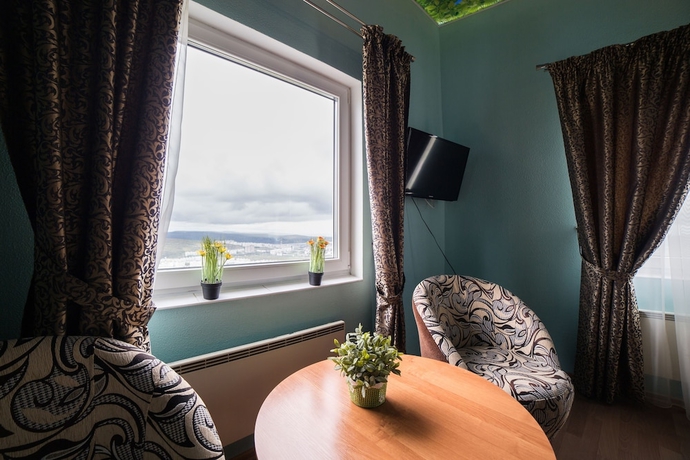 Imagen de la habitación del Hotel Ogni Murmanska. Foto 18