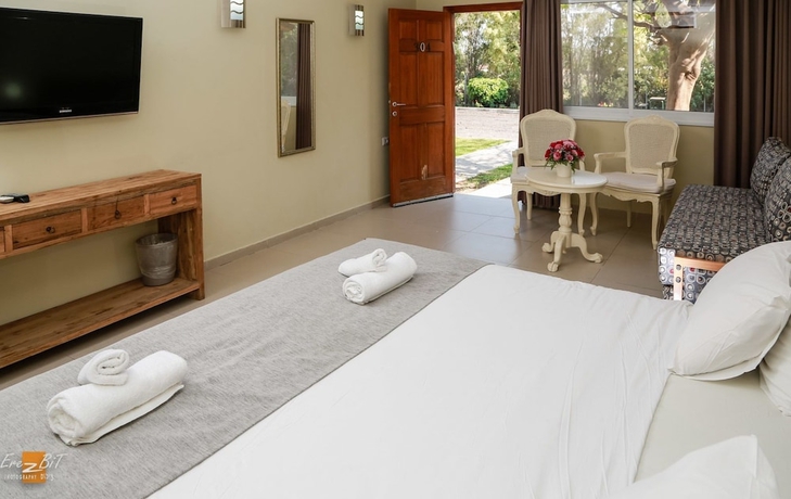 Imagen de la habitación del Hotel Ohalo Manor. Foto 17